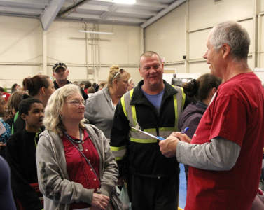 A group of guests being greeted