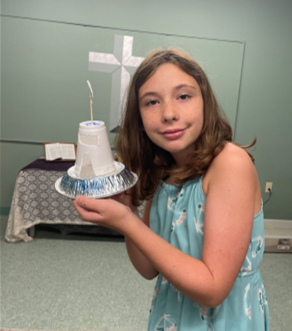 Showing off her craft
		project