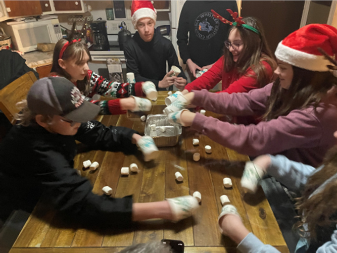 More youth in Santa hats