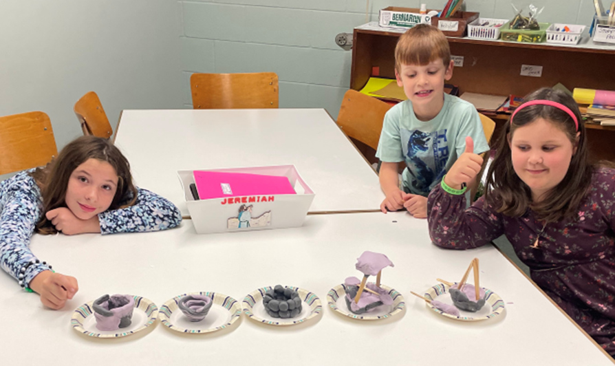 Kids showing what they made