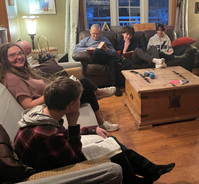 Gathered together reading the Bible