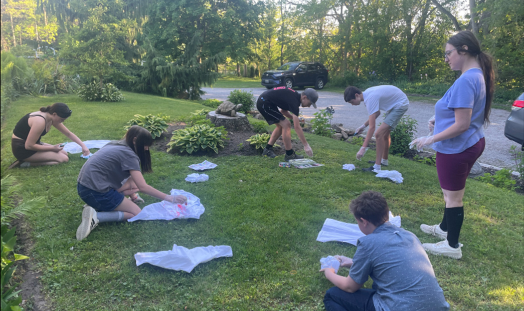 Making tie-dye on the lawn