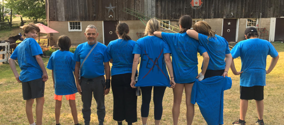 Showing off their custom t-shirts