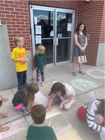 Chalk art on the sidewalk outside the
church