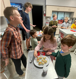 Gathered around the kitchen counter