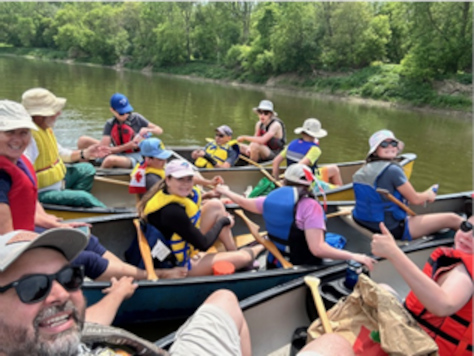 In the
		canoes, ready to go